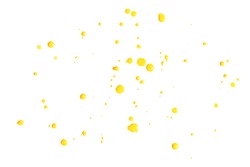 Drops of yellow paint isolated on a white background. Nail polish splatters. Abstract art texture background