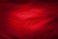 Red fabric background with vignette