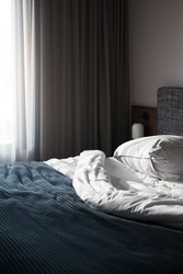 Bed linen in a modern room