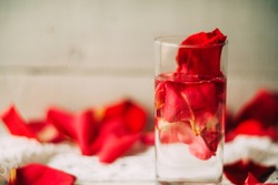 Rose petals in a bowl of water