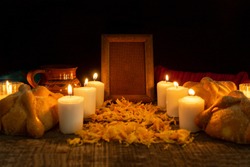 Day of the dead altar with bread and candles