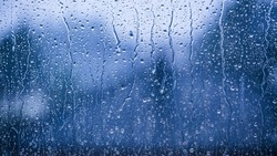 rainy days rain drops on the window surface 
