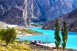 Very scenic View of turquoise Colour of attabad lake with mountains and KKH Road at Hunza Gilgit Baltistan 