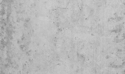 White concrete wall,Natural cement wall texture or old stone,retro-background wall texture. Concrete background gray suitable for use in classic design. Concrete loft style design ideas living home