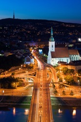 Night auto traffic with cars and buses in Bratislava, Slovakia