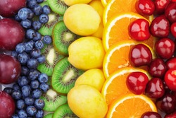 Fresh fruits.Assorted fruits colorful background. Color range
