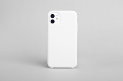 White iPhone 11 isolated on gray background, phone case mock up, smart phone back view