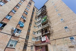 View on facade of cheap residential building. This is common type of low-cost apartment building in Russia and post-Soviet space, usually called 