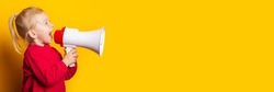 child girl shouts into a white megaphone on a bright yellow background. Banner.