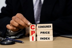 CPI, consumer price index symbol. wooden block with words CPI, consumer price index, Business and CPI, consumer price index concept