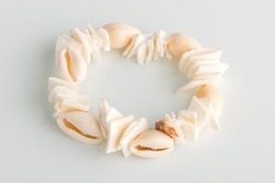 Close-up of a beautiful shell necklace. Freshwater shell bracelet. Handmade jewelry