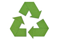 Green cardboard recycling symbol - Concept of ecology and paper recycling 