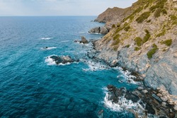 Shore rocky with reefs of coast Aegean sea, Aerial shot