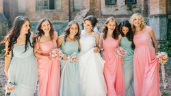 Beautiful bride with her pretty bridesmaids 