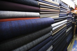Rolls of fabric and textiles in a factory shop