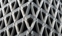 Detail of brutalist concrete diamond shaped facade of the car park in Welbeck Street , London.