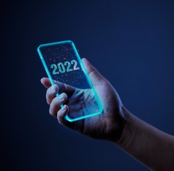 technology 2022 with mobile phone. Isolated on dark background. concept vision technology year 2022.