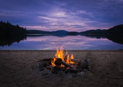 Burning campfire on the beach on my kayak camping trip