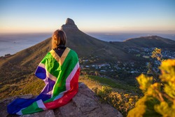 Girl holding a South African flag