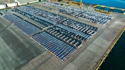 Aerial view a lot of new car for import and export shipping by ship , Smart dealership at car depot, Car at car park before shipping to customer, after production industry