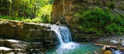 Manyavsky waterfall - a waterfall in the Ukrainian Carpathians (Gorgany massif), within the Bogorodchany district of Ivano-Frankivsk region, southwest of the village Manyava
