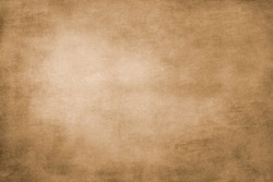 Light brown vignetted scratched background texture 