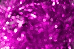 Purple mottled defocused background with lots of shiny white and lilac circles