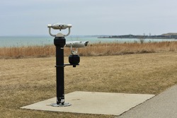 Metal viewer at observation point along Lakefront West waterfront trail in Oshawa, Ontario, Canada