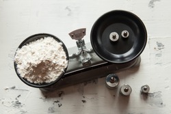 Flour in a scales 30 grams