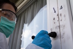 Forensic experts finds fingerprints on the window