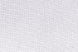 Snow white canvas background. Surface of fabric texture in white winter color.