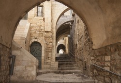 Old city hidden passageway, stone stairway and arch. Jerusalem, Israel