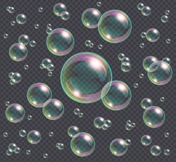 Realistic soap bubbles with rainbow reflection isolated on transparent background. Vector water foam bubbles. Colorful iridescent glass sphere.