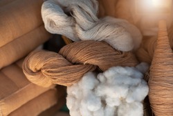 Natural cotton yarn. In rolls. Brown cotton fibers.Natural fibers to protect the environment.