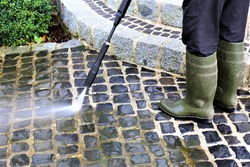 An Image of walkway cleaning - high pressure cleaner