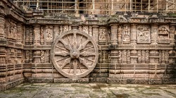 Intricate carvings on a stone wheel in the ancient  Hindu Sun Temple at Konark, Orissa, India. 13th Century AD