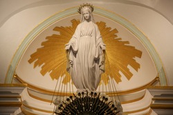 Our lady of miraculous medal statue