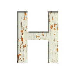 Rustic font. The letter H cut out of paper on the background of old rustic wall with peeling paint and cracks. Set of simple decorative fonts