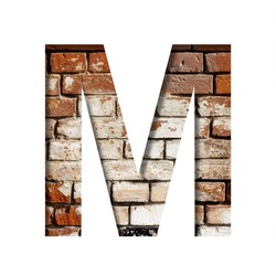 Brick font. The letter M on the background of an old brick wall with peeled paint. Decorative alphabet from old brickwork.