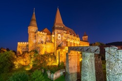 Scenic night view on illuminated Corvin Castle. Location place: Hunedoara, Transylvania, Romania.