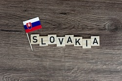Slovakia - wooden word with slovakian flag (wooden letters, wooden sign)