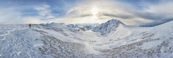 Winter landscape, a ski track in the snow, mountains of the Altai. The Altai Republic. Traveling to the mountains in the winter.