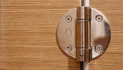 stainless door hinges on wooden swing door for interior design at home