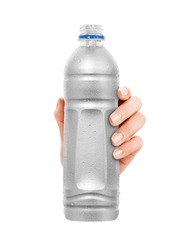 Close-up of hand holding Empty plastic Bottle with condensation. isolated on white Background. front view.