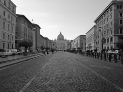 Perspective view from far of St. Peter Basilica black and white, Vatican Rome