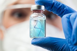 UK lab scientist biotechnologist holding glass ampoule phial with DNA strand,molecule of two polynucleotide chains forming double helix carrying Coronavirus genetic instruction,new strain RNA mutation