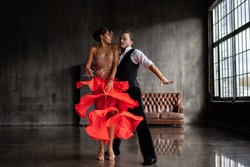 young beautiful couple dancing tango