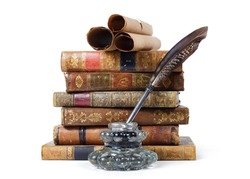 Stack of antique books, inkwell with quill pen and old scrolls, on white background 