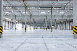 Clean and empty industrial hall in detail for supporting poles