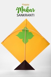 Yellow kite on isolated white background, Happy Makar Sankranti 